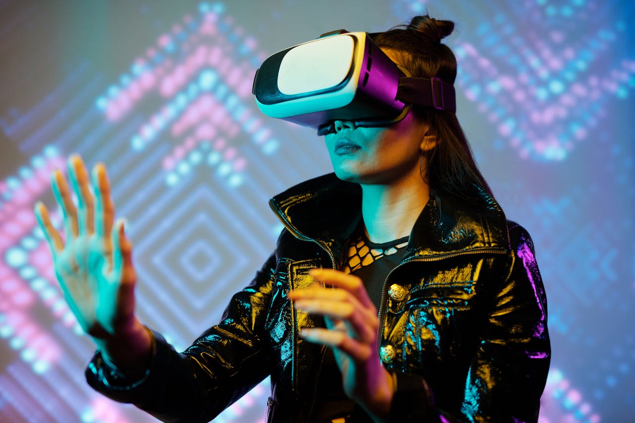 our-services-2 Woman using VR headset with interactive neon lights indoors, embracing digital innovation.